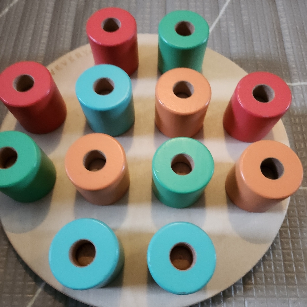 Lovevery stacking wood toy